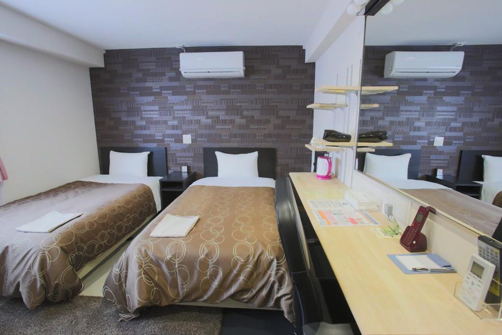 Business Hotel Ban Tokyo Bagian luar foto