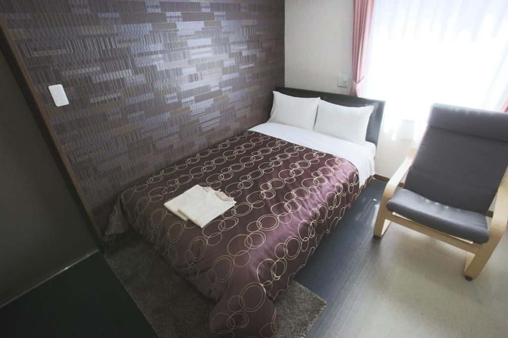Business Hotel Ban Tokyo Bagian luar foto