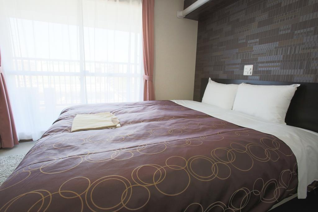 Business Hotel Ban Tokyo Bagian luar foto