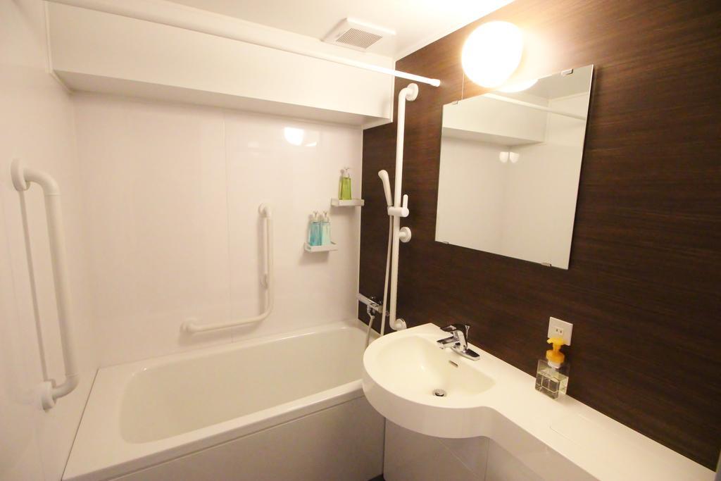 Business Hotel Ban Tokyo Bagian luar foto