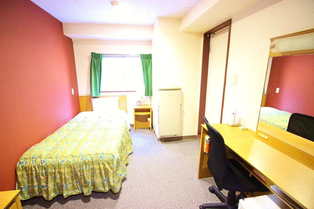 Business Hotel Ban Tokyo Bagian luar foto