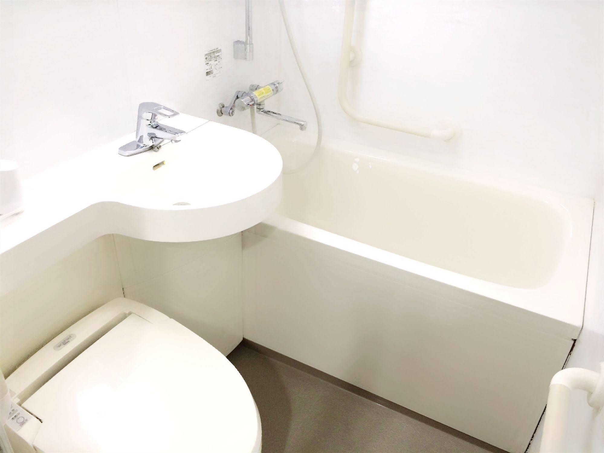 Business Hotel Ban Tokyo Bagian luar foto