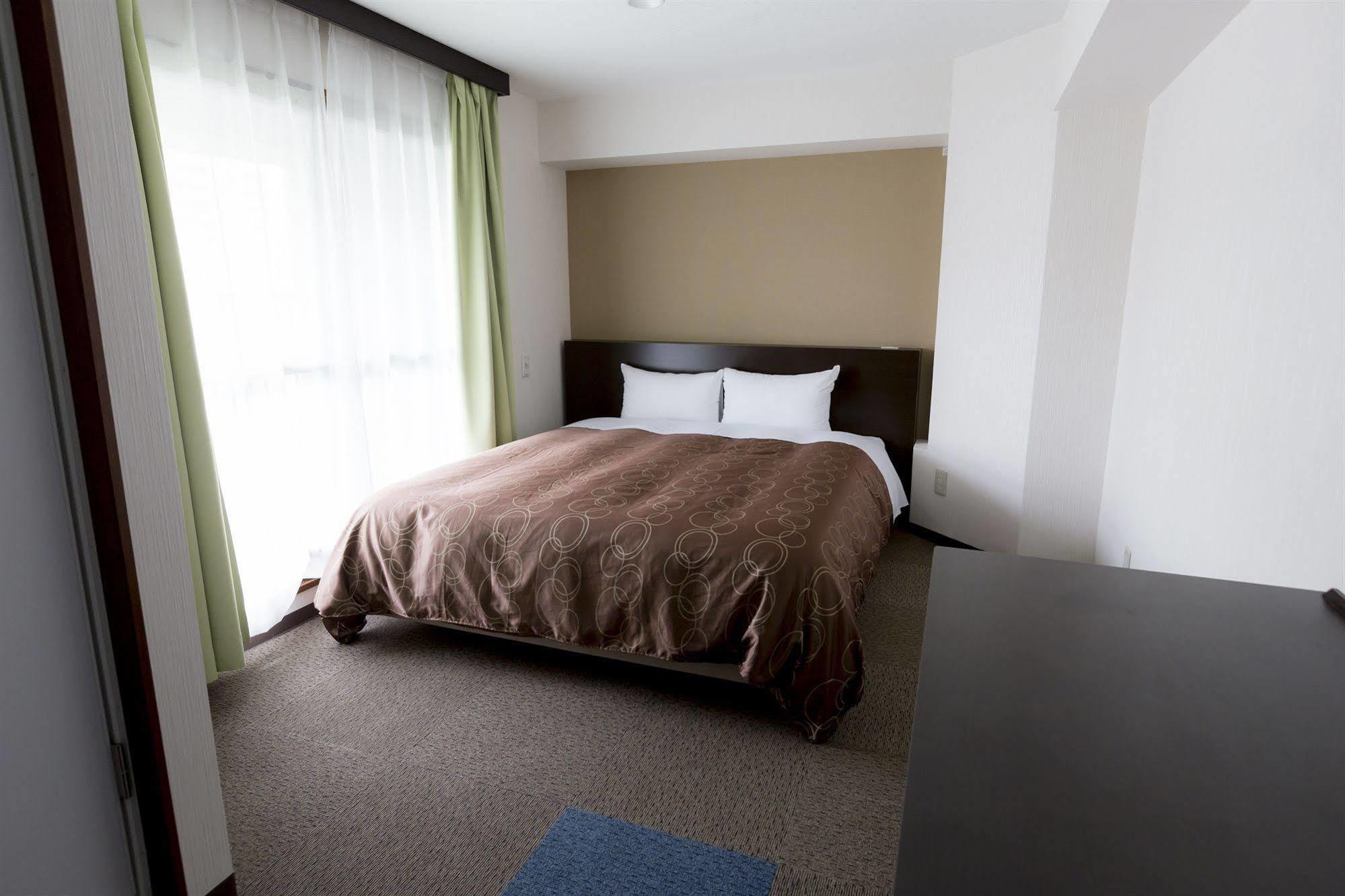 Business Hotel Ban Tokyo Bagian luar foto