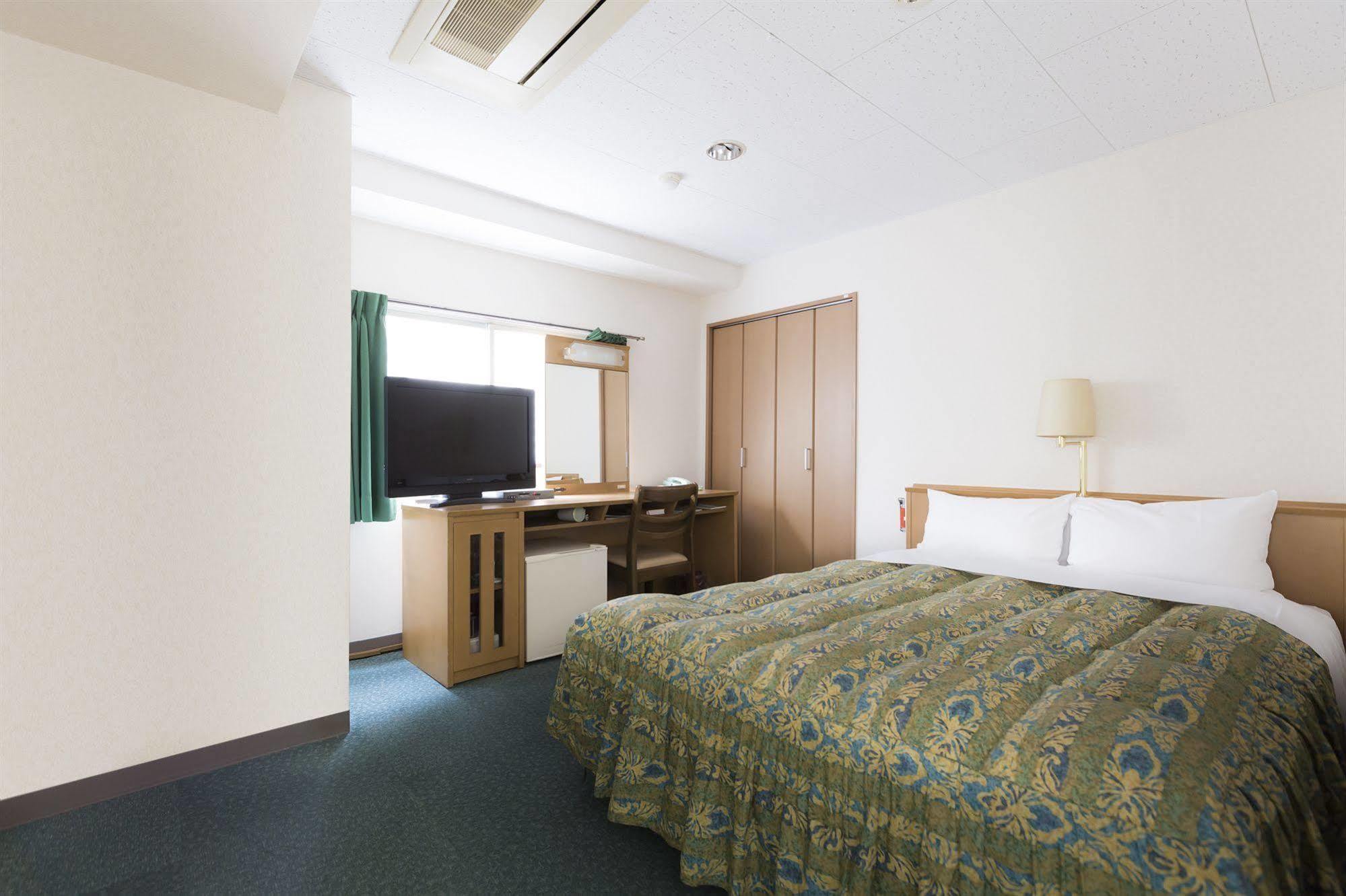 Business Hotel Ban Tokyo Bagian luar foto