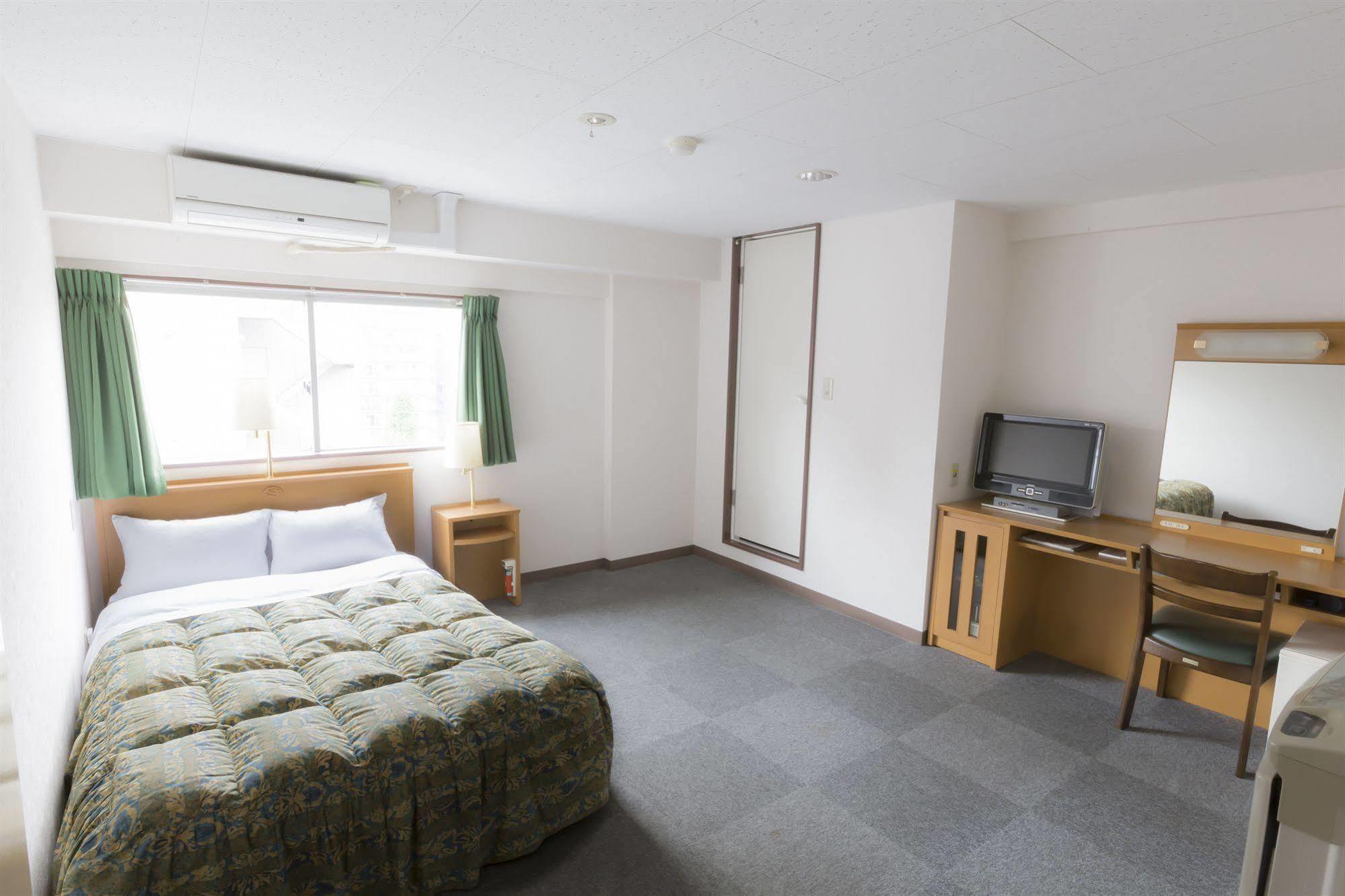 Business Hotel Ban Tokyo Bagian luar foto