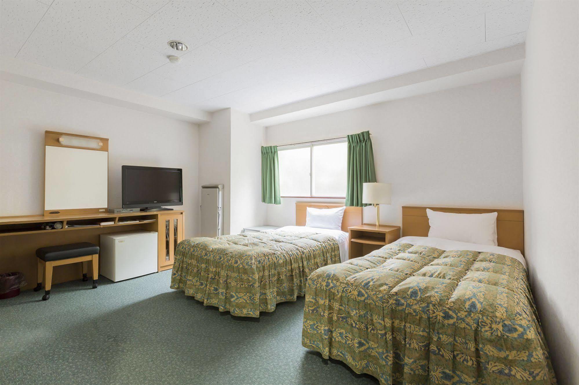 Business Hotel Ban Tokyo Bagian luar foto