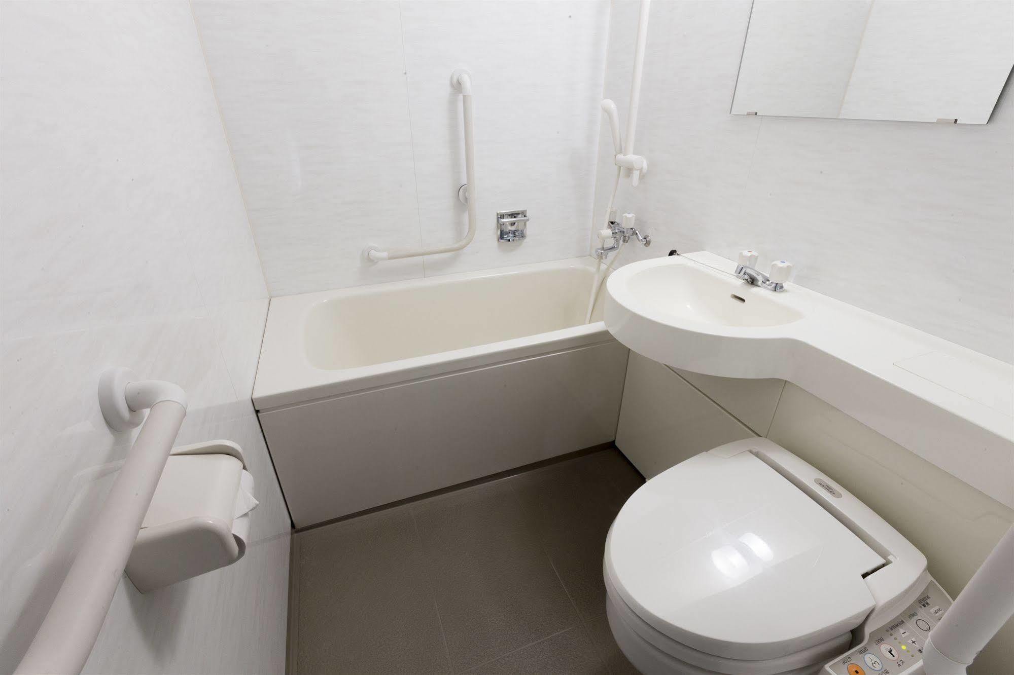 Business Hotel Ban Tokyo Bagian luar foto